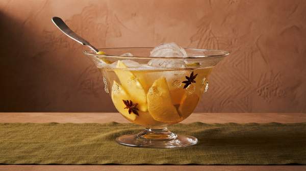 Editorial illustration for Why the Holiday Punch Bowl Deserves Its Comeback: The Five-Part Formula That Lets You Stop Playing Bartender